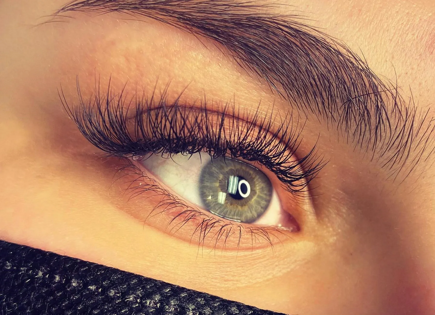 Close detail of a finished set of lash extensions